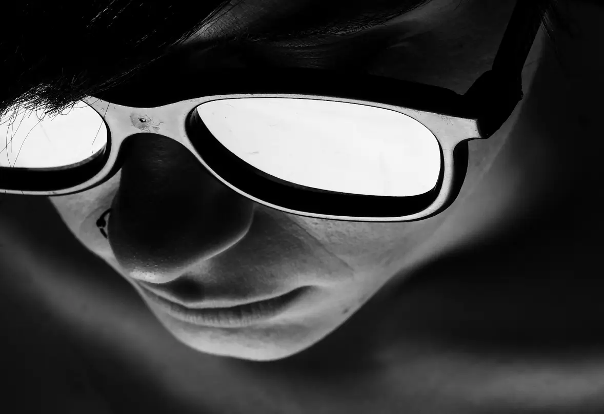 close up man looking at the screen